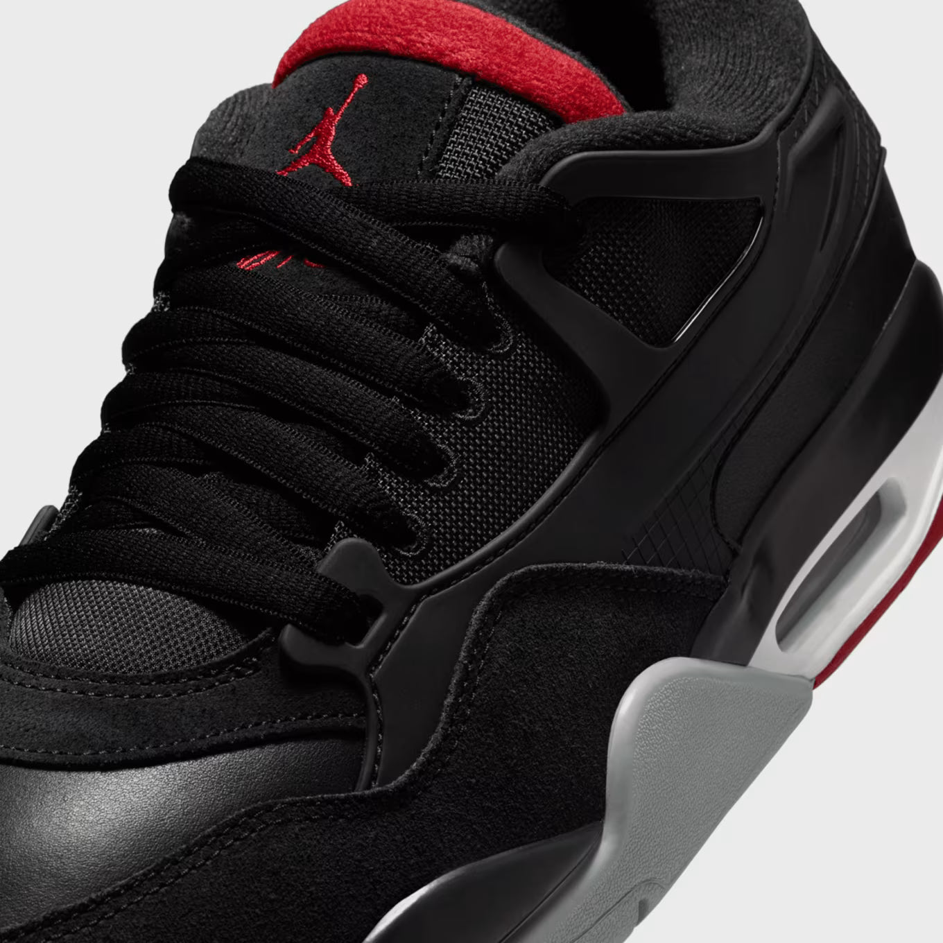 Air Jordan 4 RM Hombre — Negro/Rojo